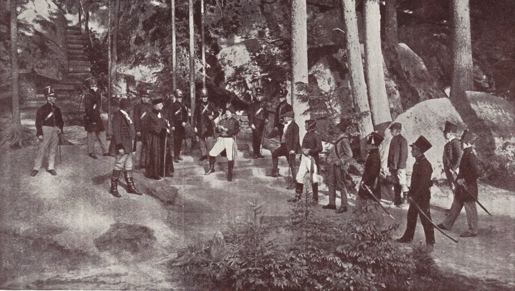 historisches Foto in schwarz und weiß einer alten Aufführung von Soldaten