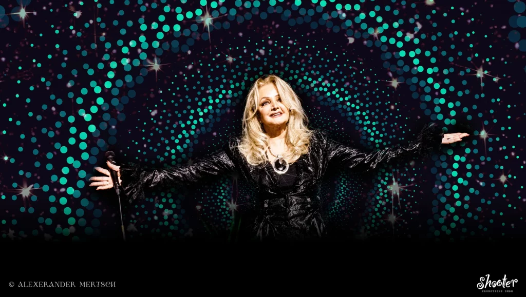 Ein Foto von Bonnie Tyler. Unten links steht © Alexerander Mertsch, unten rechts ist das Logo von Shooter Promotions GmbH